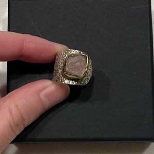 Sterling silver ring with purple stone